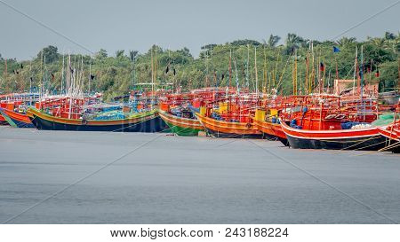 Sunderbans, West Bengal, India - June 5, 2017: Wooden Fishing Boats Painted With Different Colors Li