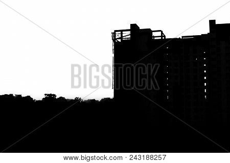 Silhouette Of Construction Site At Sunset- Cityscape