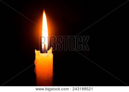 Abstract Single Lit Candle With Quite Flame