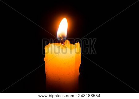 Abstract Single Lit Candle With Quite Flame
