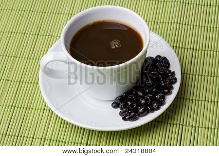 Filiżankę kawy na obrus zielony expresso