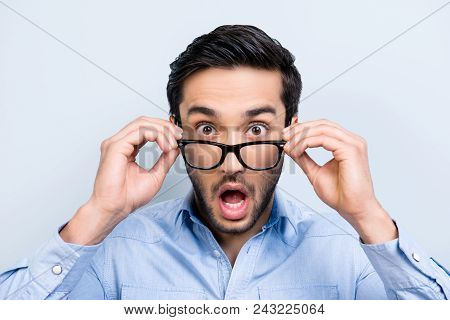 Omg! Wtf! Head Shot Of Shocke  Funny Guy With Black Hair Wide Open Mouth Big-eyed Looking Out Glasse
