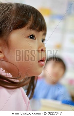 Japanese Girl In Playwear In Her Classroom (3 Years Old) (white Back)