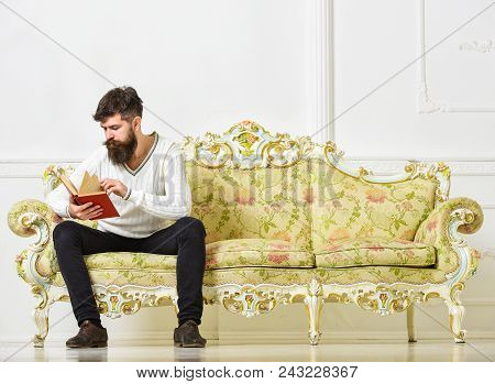 Self Education Concept. Guy Reading Book With Attention. Macho On Concentrated Face Reading Book, St
