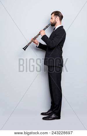 Side View Half Face, Full Size Fullbody Portrait Of Stylish Talented Musician With Hairstyle In Blac