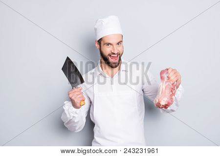 Portrait Of Crazy Funny Butcher With Stubble Having Cleaver And Fresh Meat In Arms, Shouting, Scream