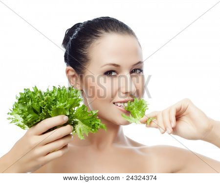 salat 먹고 화이트 스튜디오 촬영에 고립 된 매력적인 백인 웃는 여자의 초상화
