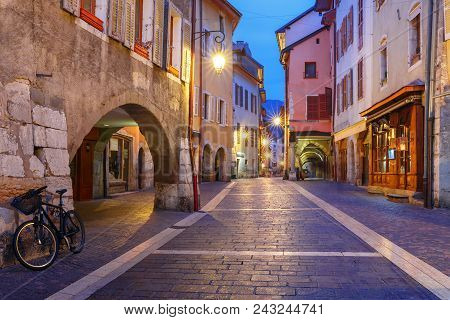 Nice Street Rue Sainte-claire In Old Town Of Annecy At Rainy Night, France