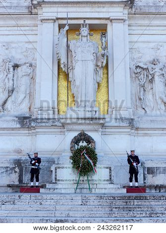 Rome, Italy - January 1, 2017: Tomb Of The Unknown Soldier, Under The Statue Of Goddess Roma. The To