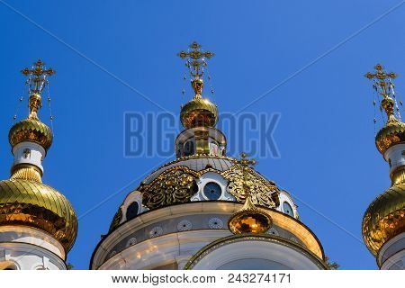 Orthodox Crosses On Gold Domes Blue Sky With Clouds