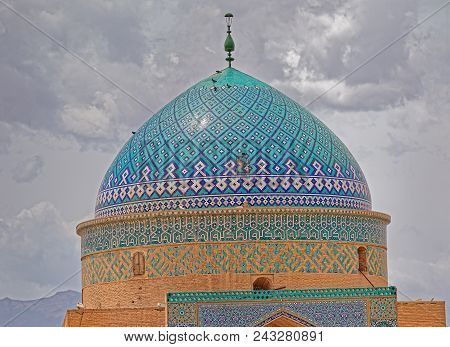 Yazd, Iran - May 5, 2015: Yame Mosque Beautiful Dome Decorated With Mosaic Art In Old City Center.