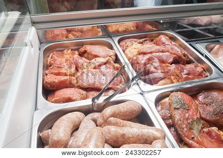 Various Pieces Of Meat On A Cutting Table