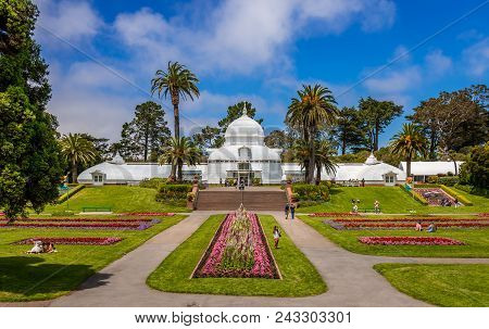 San Francisco, CA, USA - July 16, 2015: View of the Conservatory of Flowers, a greenhouse and botanical garden that houses a collection of rare and exotic plants, in Golden Gate Park.