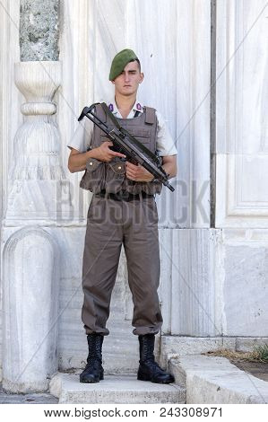 Istanbul, Turkey - July 21, 2015 : Military Policeman Armed With Submachine Gun On Duty Next To Topk