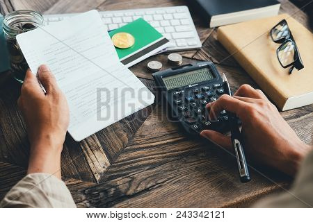 Close Up Asian Business Woman Using A Calculator To Calculate The Numbers.business Finances And Acco