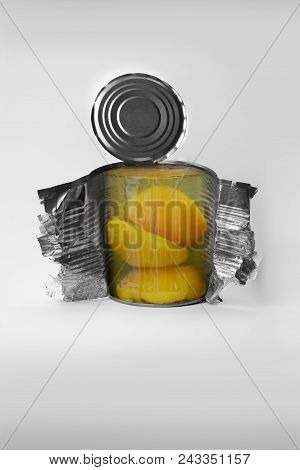 Peach With Syrup In The Nuri Of A Cut Iron Jar.abstract Image Of A Peach Canned In A Cut Jar