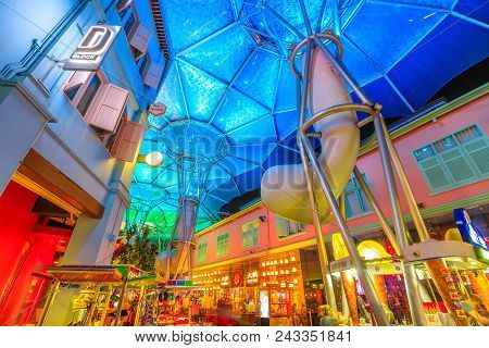 Singapore - May 5, 2018: Futuristic Umbrellas And Colorful Ceiling Cover The Streets Of Clarke Quay,