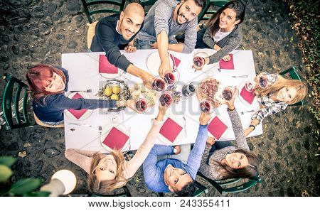 Friends Having Dinner In Garden