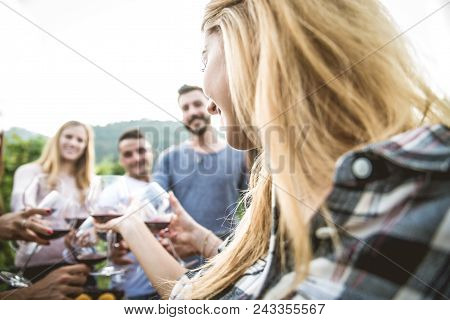 Friends Having Dinner In Garden