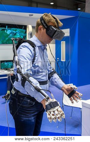 Berlin - April 26, 2018: The Stand Of Roscosmos. Demonstration Of The Operation Of The Hardware-soft