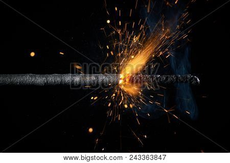 Close Up Burning Sparkler Or Bickford Cord Isolated On Black Background