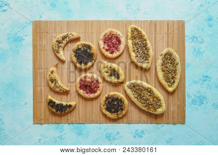 Scones With Herbs Spices On A Bamboo Napkin. Top View. Arabic Cuisine.