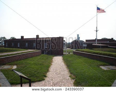 Buildings And United States Of American Flag At The Fort Mchenry National Monument And Historic Shri