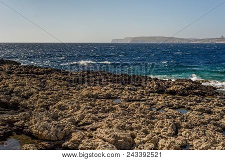 Photo of Sea water beating against rock, Cirkewwa, Malta