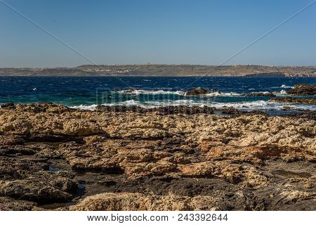 Photo Of Sea Water Beating Against Rock, Cirkewwa, Malta