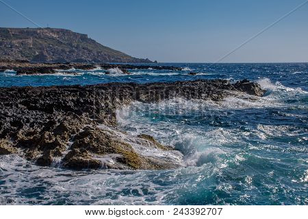Photo Of Sea Water Beating Against Rock, Cirkewwa, Malta