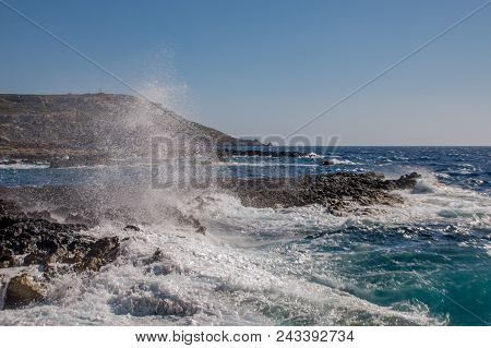 Photo Of Sea Water Beating Against Rock, Cirkewwa, Malta