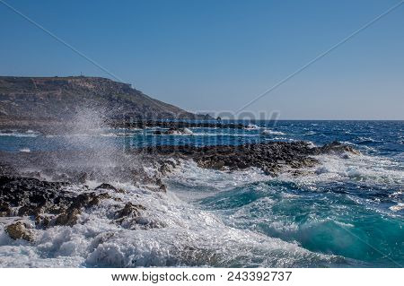 Photo Of Sea Water Beating Against Rock, Cirkewwa, Malta