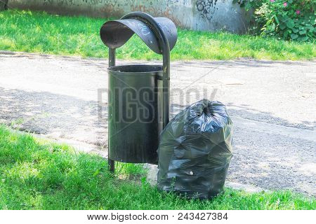 Bag For Garbage. The Garbage Is Filled Inside And Around The Outer Vessel.
