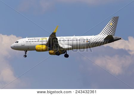 Borispol, Ukraine - May 25, 2018: Ec-mge Vueling Airbus A320-200 Aircraft On The Cloudy Sky Backgrou
