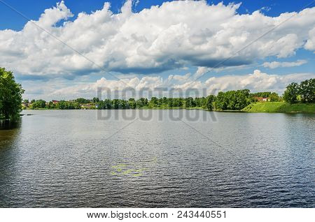 Summer Landscape With Lake Summer Landscape With A Lake And Clouds In The Blue Sky