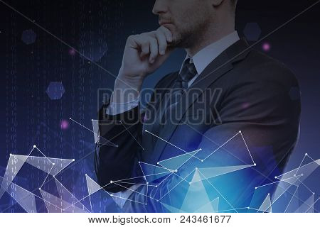 Thoughtful Young Businessman With Digtal Business Interface. Technology, Innovation And Computing Co