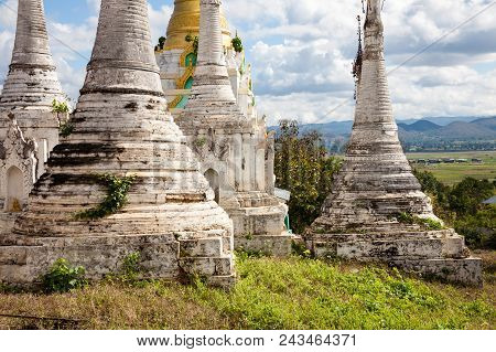 Some Old Stupas On A Hill In The South Of The Inle Lake In The Village Of Thaung Tho In Central Burm