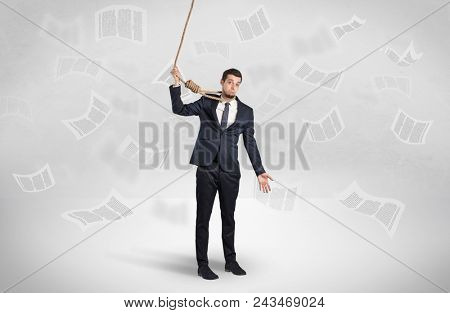 Young burnout businessman with flying documents concept
