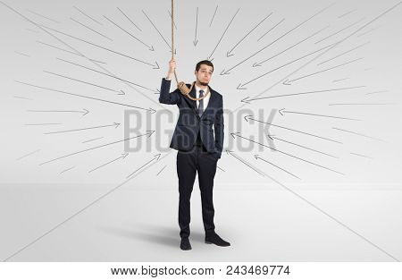 Hopeless young businessman trying to suicide with question signs concept