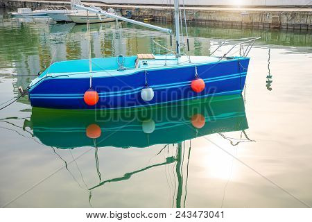 Elements Of Blue Fishing Boat On Sea Water