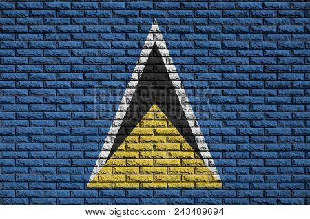 Saint Lucia Flag Is Painted Onto An Old Brick Wall