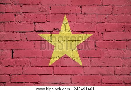 Vietnam Flag Is Painted Onto An Old Brick Wall