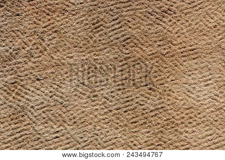 Brown Sandstone Wall Texture Details. Close-up Photo Of Gritty Background. Horizontal Orientation