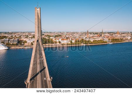 An Aerial View Of The Vansu Bridge Or Suspension Bridge That Spans The River Daugava In The Latvian 