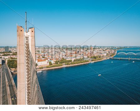 An Aerial View Of The Vansu Bridge Or Suspension Bridge That Spans The River Daugava In The Latvian 