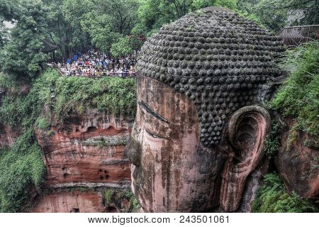 The Detail Of Leshan Giant Buddha 71 Meters Tall Stone Statue Carved Out Of The Cliff, Faces Conflue
