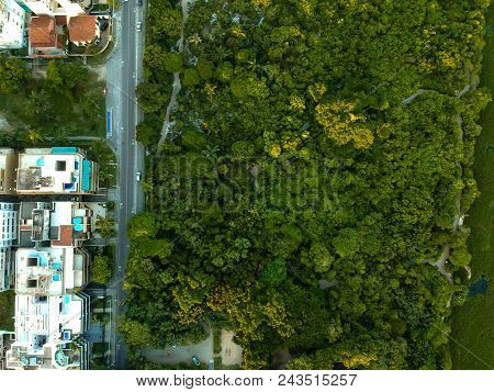 Aerial View Of Sunset On Lagoon In Recreio Dos Bandeirantes On A Summer Day. Green Vegetation Can Be
