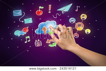 Female hand toucing mixed media icons with purple background