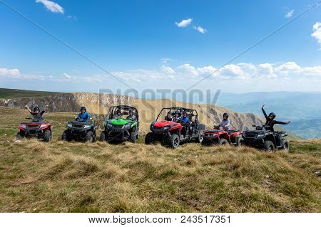 Friends Driving Off-road With Quad Bike Or Atv And Utv Vehicles.