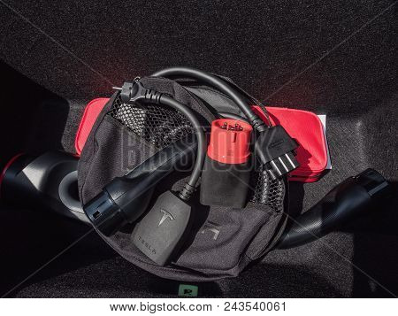 Urmond, Netherlands - May 31, 2018. Original Set Of Chargers In The Tesla Bag. Charging Cable For El